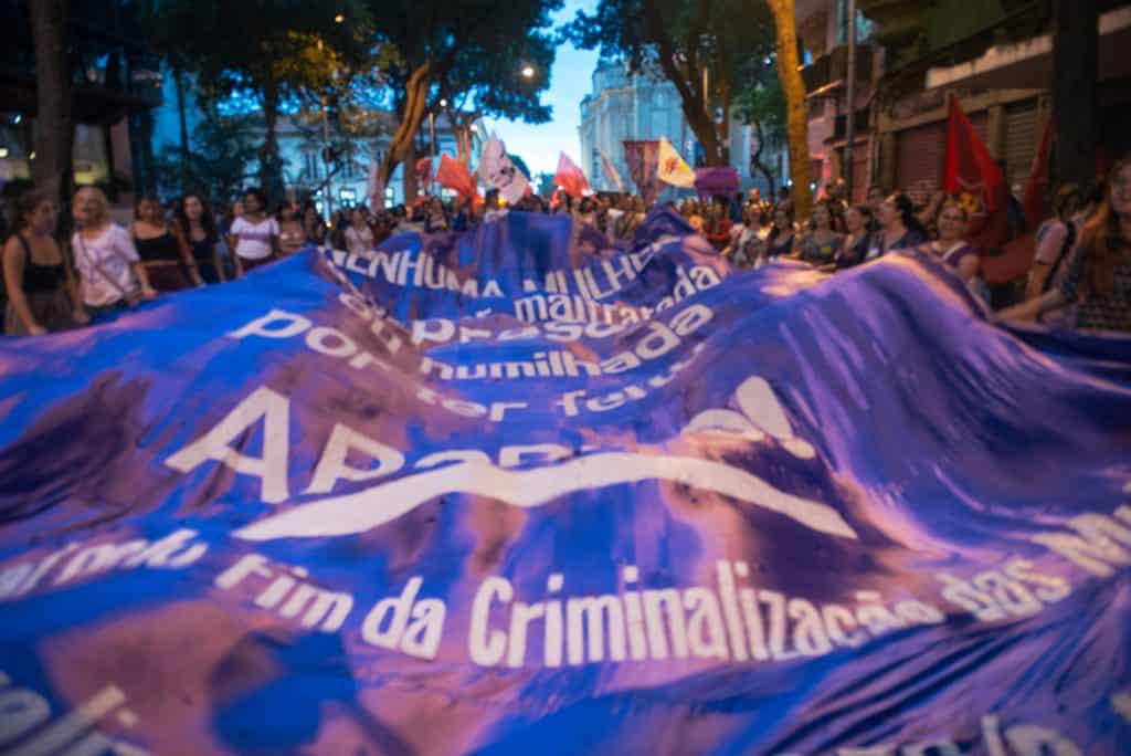 Purple protest banner forms a wave