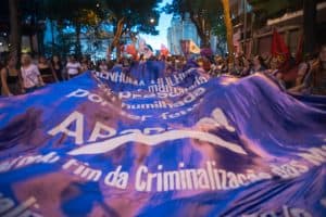 Purple protest banner forms a wave