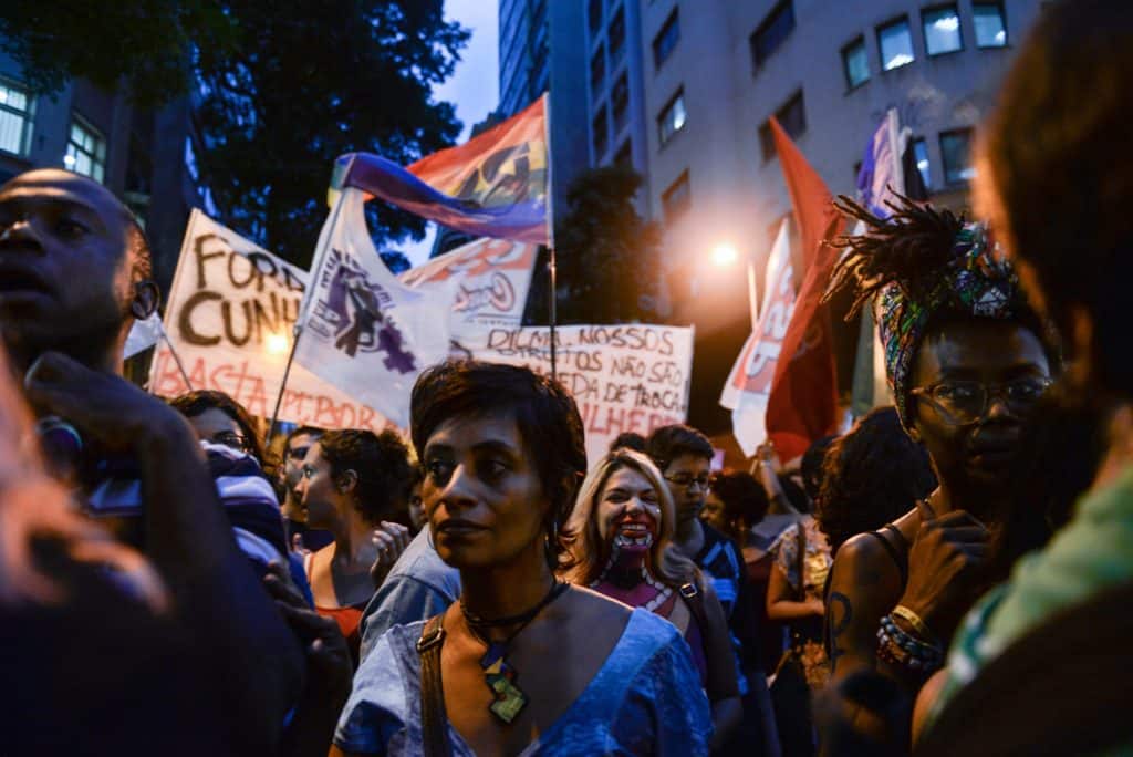 Protestor stands in crowd