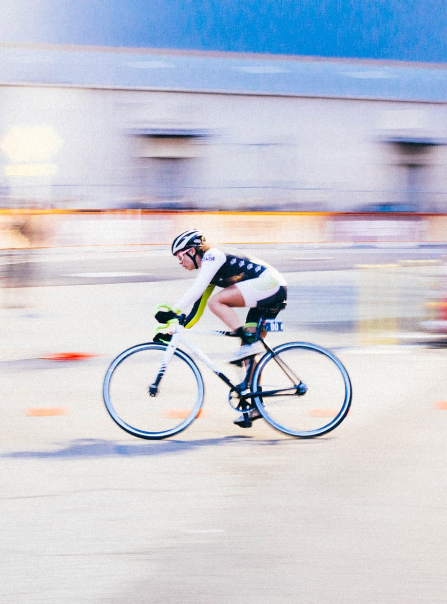 Racing cyclist with a backdrop that fades into a blur